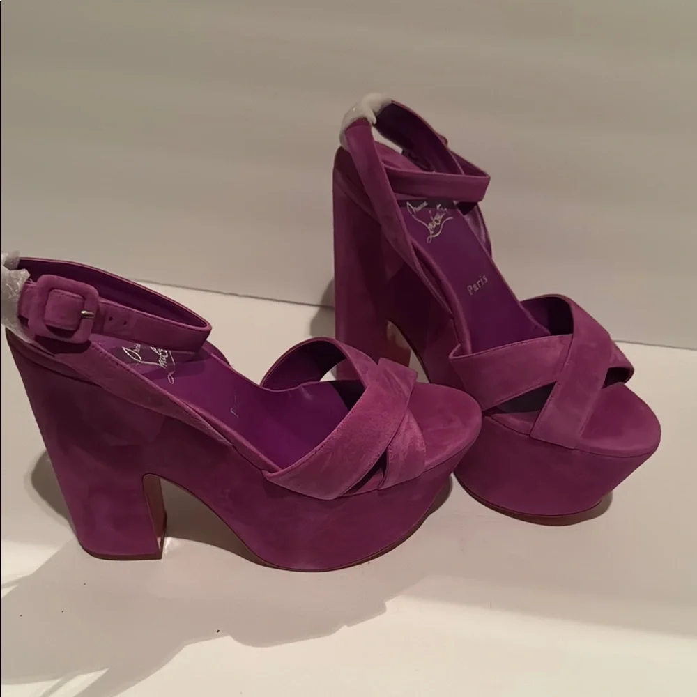 Brand New. Never worn. Christian Louboutin Purple Platform Sandals